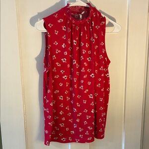 Pink sleeveless blouse